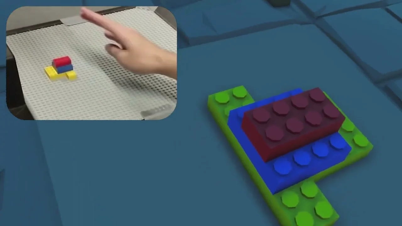 A hand placing real Lego bricks on a baseplate beside the same model rendered in VR.